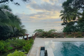 Infinity pool overlooking the Pacific Ocean at sunset in Santa Catalina, Panama