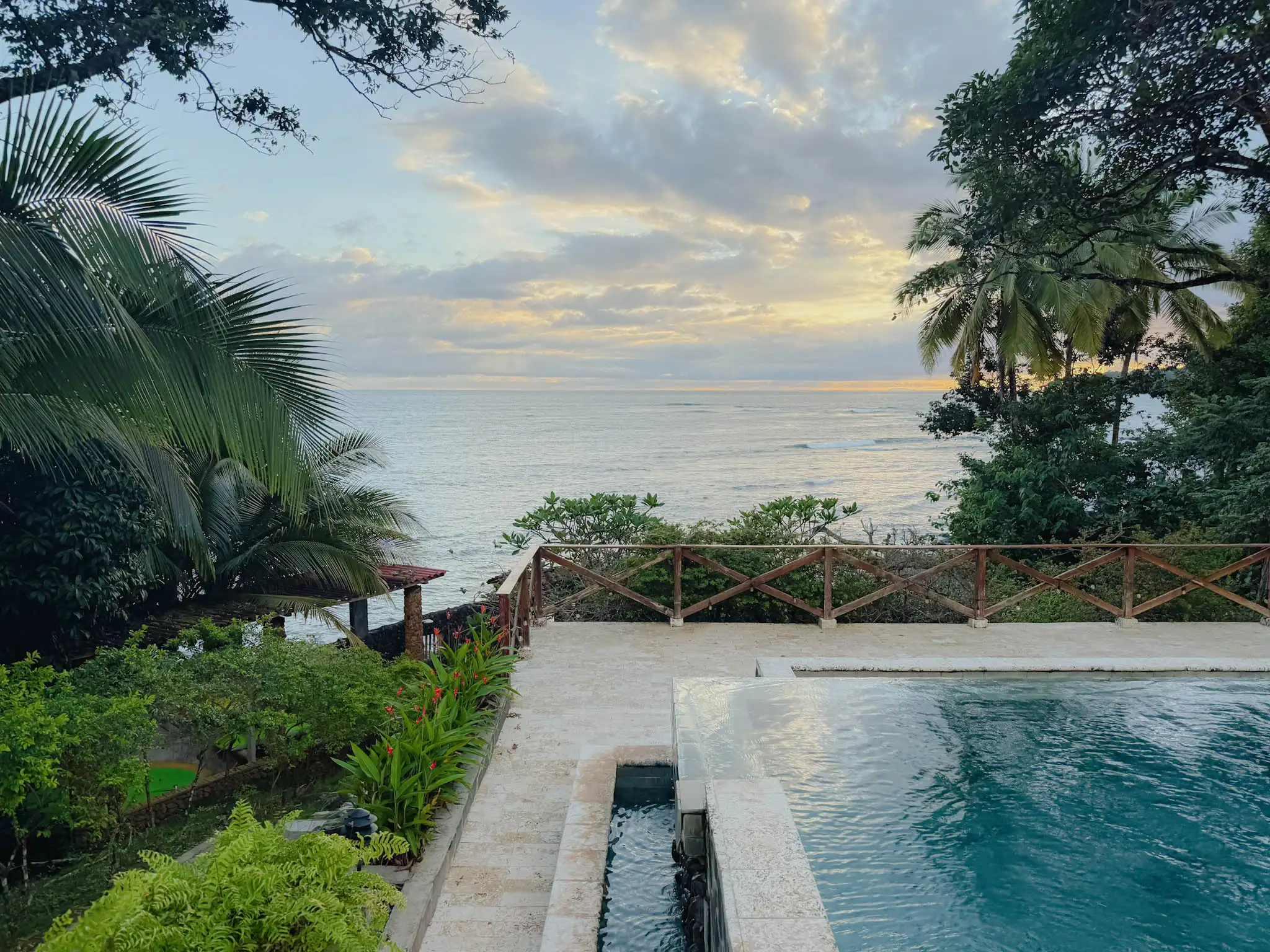 Infinity pool overlooking the Pacific Ocean at sunset in Santa Catalina, Panama