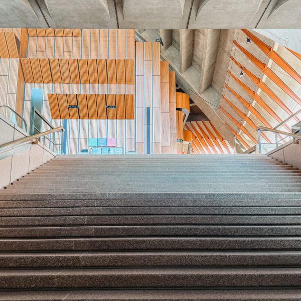 Australia – Sydney-088 Looking up stairs in the interior of a concrete building with wood ceilings - top things to do in Sydney
