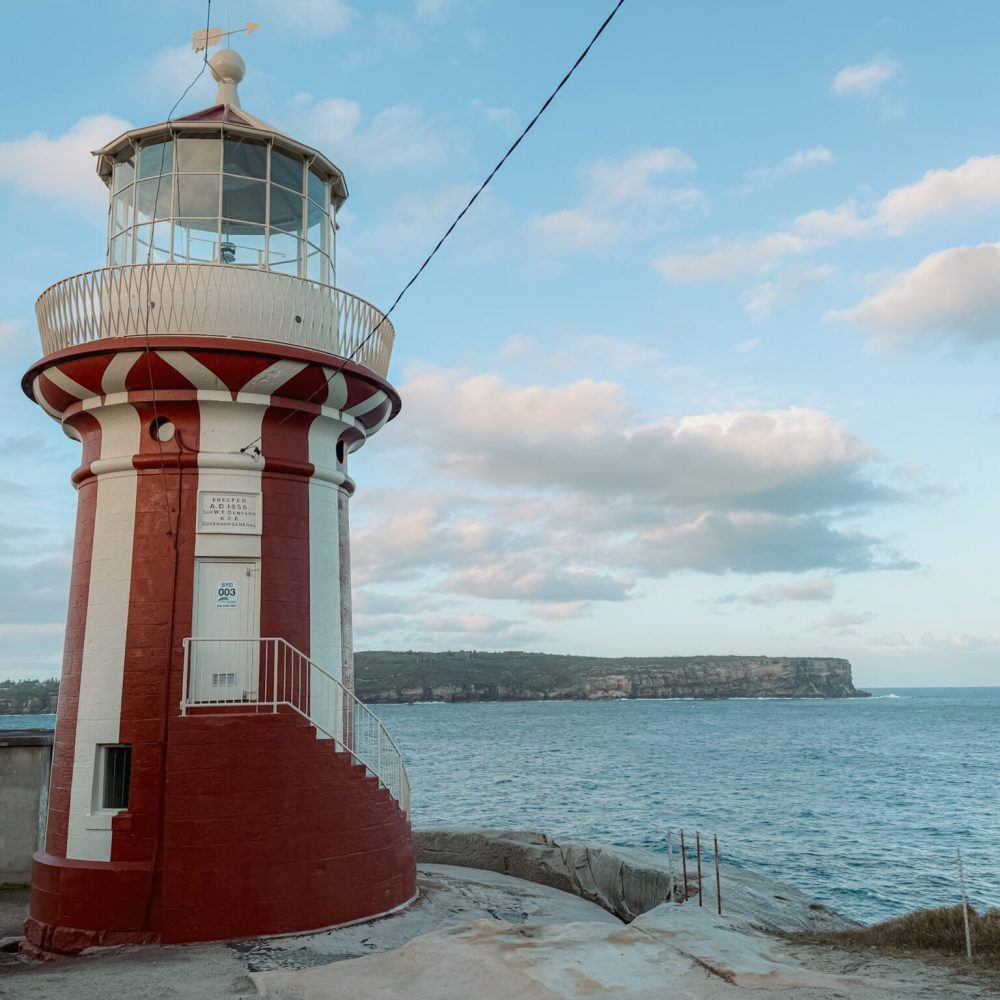 A red and white vertically striped lighthouse - Sydney itinerary