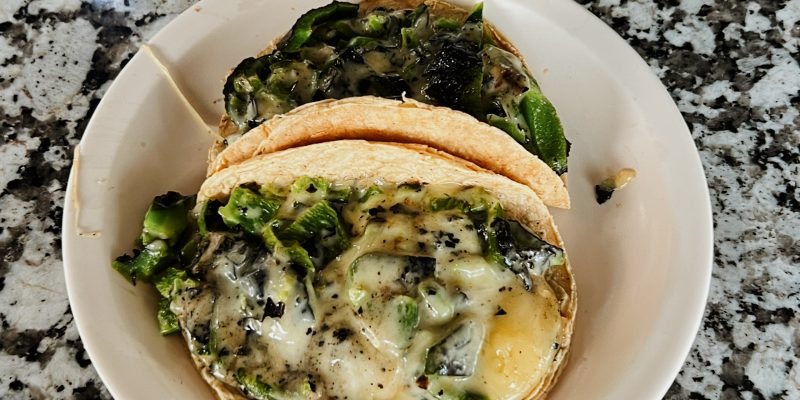 Two of the best tacos in Mexico City on a plate