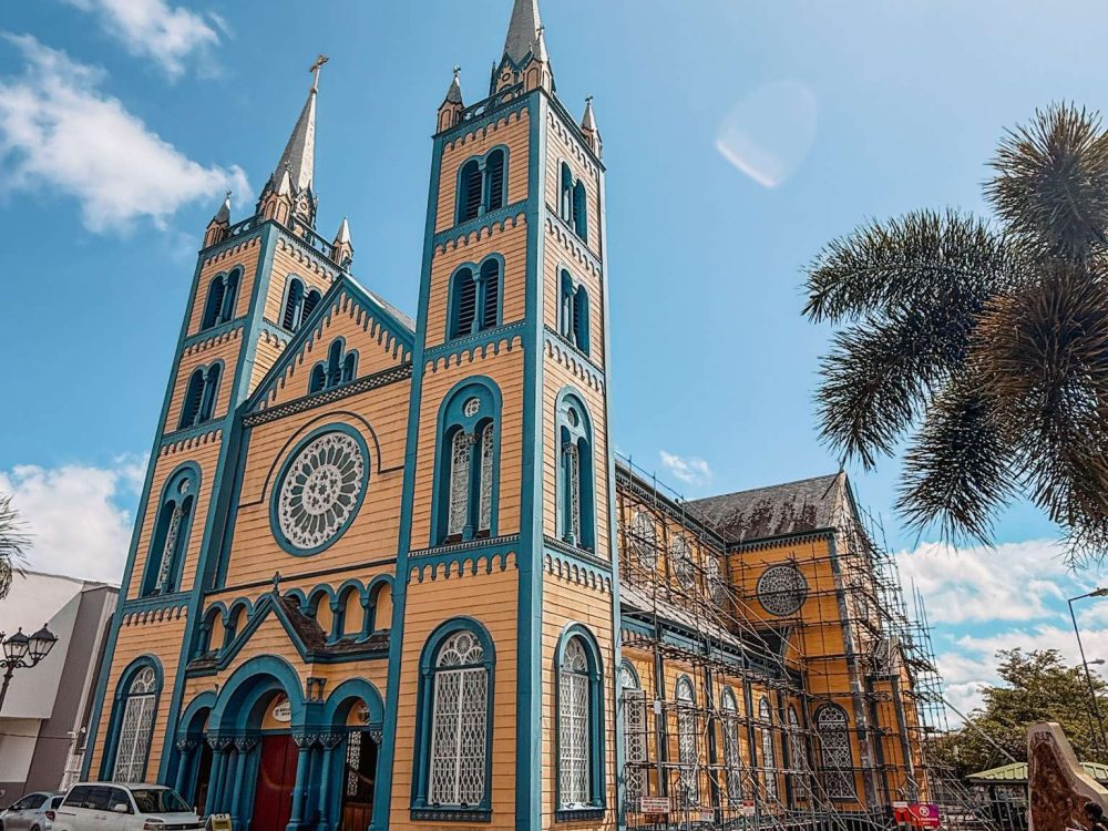 Suriname – Paramaribo-34 When looking to visit the Guianas, you can do a tour of Paramaribo with historical colonial buildings such as this blue and yellow church