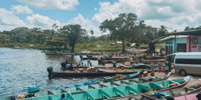 When looking to visit the Guianas, you can do a tour to a maroon community that departs from the boat docks on these colorful pirogues
