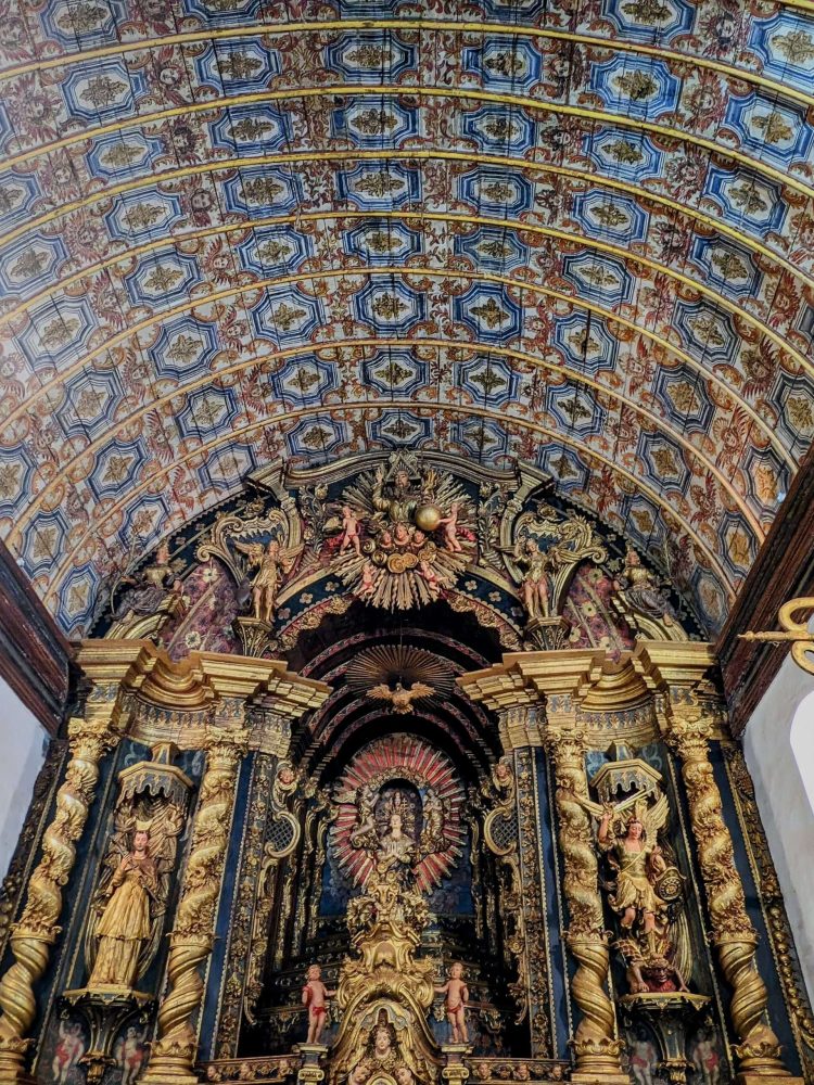 Templo de San Buenaventura – Paraguay – 1 Ornate gold altar with a wood painted ceiling in a church that is part of the Circuito de Oro