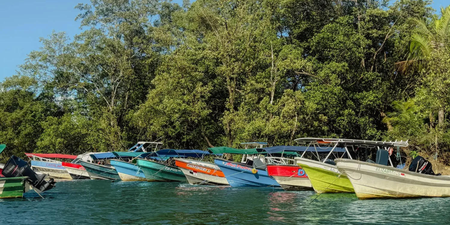 santa-catalina-panama-tour-boats Colorful local tour boats moored along the shore in Santa Catalina, Panama